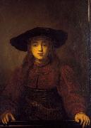 REMBRANDT Harmenszoon van Rijn The Girl in a Picture Frame, oil on canvas